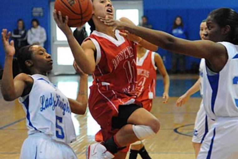 Rancocas Valley's Lauren Gaskill (center) has been named South Jersey Girls' athlete of the year. (Clem Murray/Staff Photographer)