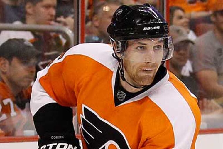 Braydon Coburn's wife delivered the couple's first child, a girl named Rory, on Monday morning. (Yong Kim/Staff Photographer)