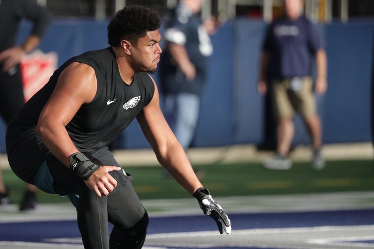 Eagles offensive tackle Andre Dillard warms up before the Philadelphia Eagles play the Dallas Cowboys at AT&T Stadium on Sunday.