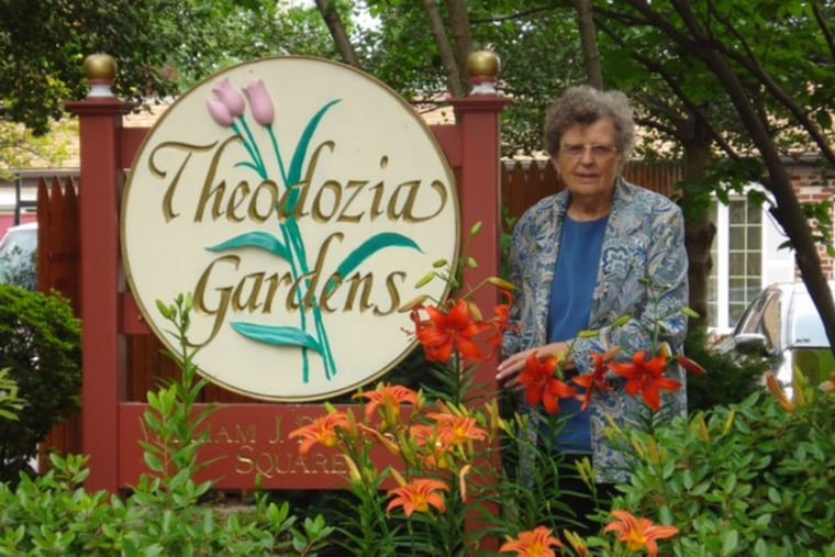 Theodozia K. Pastuszek in the garden on Park Avenue in Swarthmore that bears her name.
