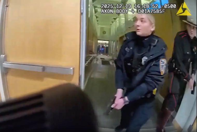 This image from police body cam video provided by Providence Police shows police responding at the scene of a shooting at Brown University in Providence, R.I., on Dec. 13.