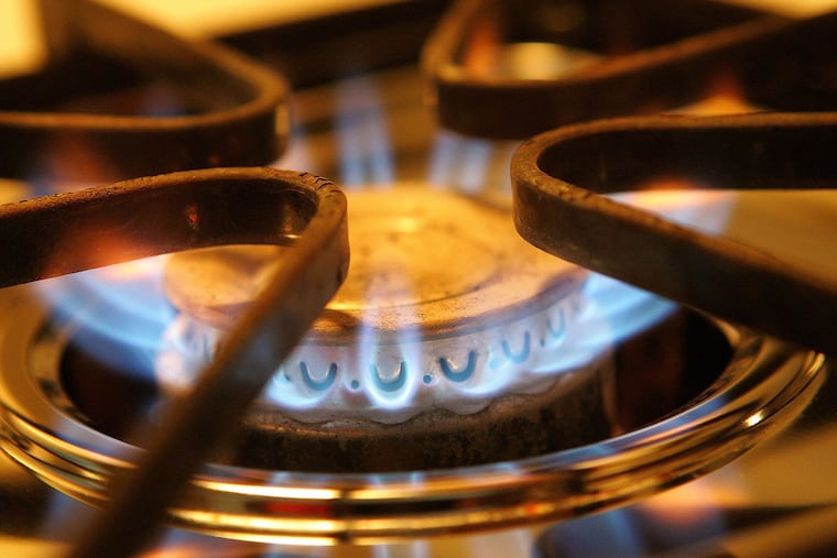 A gas burner on a stove.