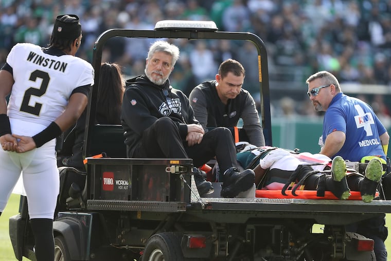 Eagles defensive end Josh Sweat is carted off the field after suffering a neck injury against the New Orleans Saints.