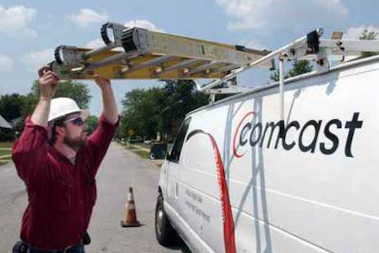 A Comcast communications technician from file photo.