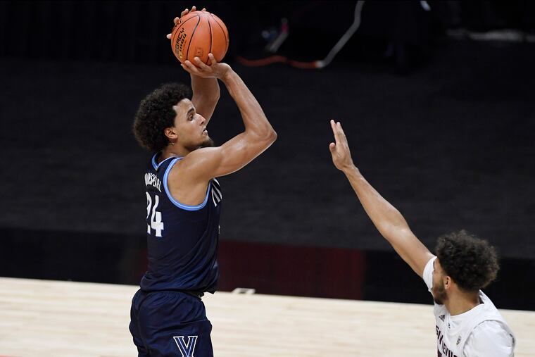 Villanova's Jeremiah Robinson-Earl shoots over Arizona State's Taeshon Cherry.