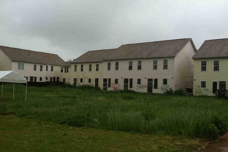 A back view shows a cluster of the townhouses in the Lanning Square West development. Ofthe money Camden owes, $193,000 comes from that failed affordable-housing project alone.