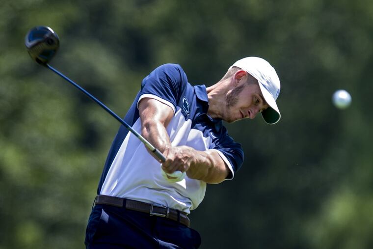JD Hughes, a Penn State junior from Carlisle, Pa., keeps his head down as he tees off on the 4th hole at White Manor Country Club during the second round of the Pennsylvania Amatuer tournament Aug. 1, 2017. CLEM MURRAY / Staff Photographer