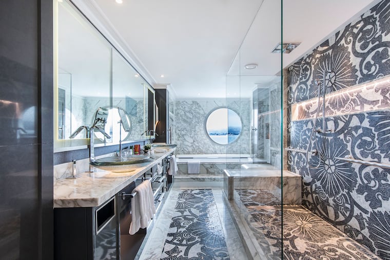The Serenity, one of four luxury-class ocean ships in Crystal Cruises' relatively small fleet, has a passenger capacity of about 1,000. The bathroom in the accommodation known as a Crystal Penthouse.