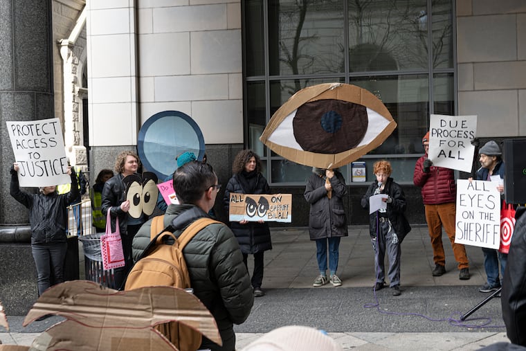 Members of No ICE Philly rally outside the Criminal Justice Center on Thursday, calling on the sheriff to cut off Immigration and Customs Enforcement access to the building.