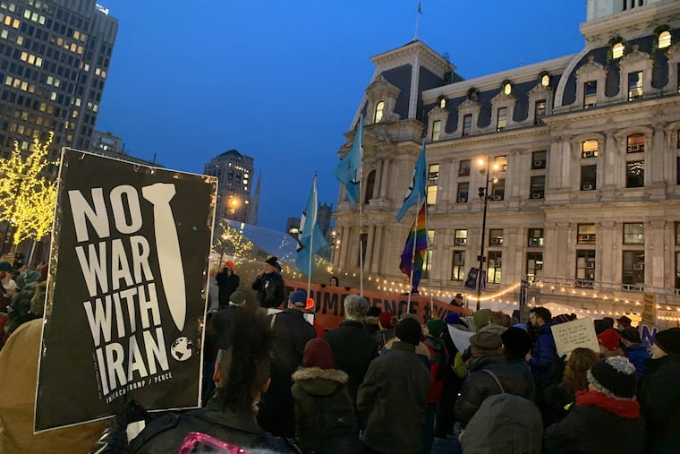 Protesters rally against conflict with Iran near City Hall in Philadelphia on Thursday, Jan. 9, 2020.