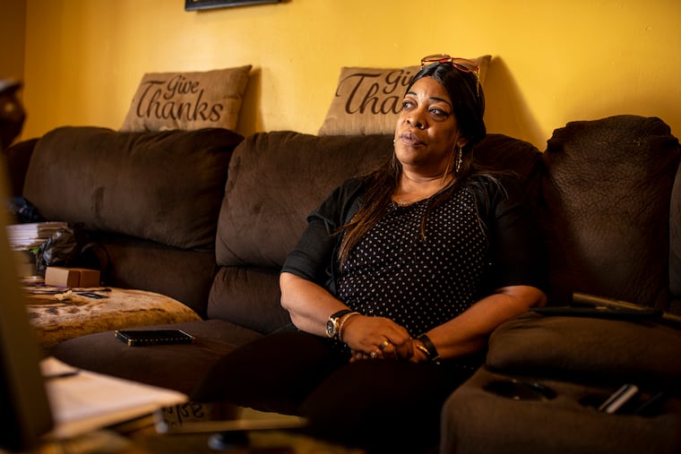 Janice Brown, 58, of Northeast Philadelphia speaks about the loss of her daughter, Latoya Smith, 22, and her 11-month-old granddaughter, Rimanee Smith. One of the two men sentenced to life without parole for their 2009 deaths and those of two others may soon be released from prison.