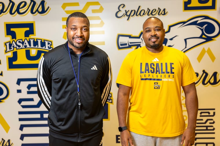 La Salle coach Darris Nichols (left) and his brother, associate head coach Shane Nichols, hope to lead the Explorers back to success.