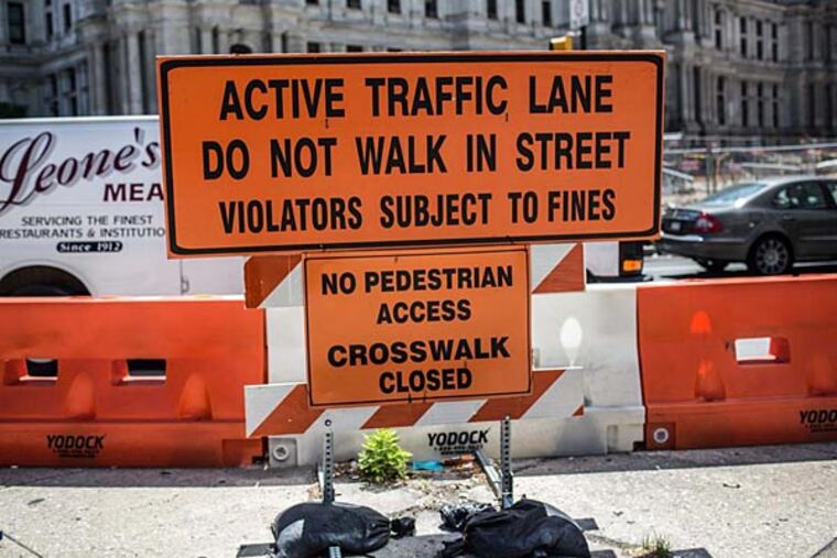 Center City District officials say that several unexpected snags in the construction phase of the Dilworth Plaza makeover as well as cost overruns are pushing the end date to Labor Day at the earliest. The original date of completion was slated for spring 2014. (Colin Kerrigan / Philly.com)