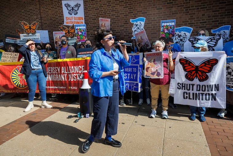Viri Martinez, of the New Jersey Alliance for Immigrant Justice, speaks to the crowd as immigrant-rights groups rally outside the Third Circuit Court of Appeals on Thursday. Demonstrators gathered as the court considers the legality of a New Jersey ban on immigration-detention contracts, Thursday, May 1, 2025.