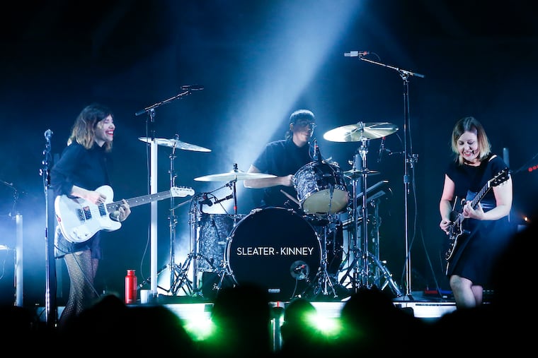 Sleater-Kinney members (from left-right): guitarist/vocalist Carrie Brownstein, guitarist/vocalist Corin Tucker and drummer Angie Boylan perform at the Fillmore Philadelphia on Sunday, October 27, 2019.