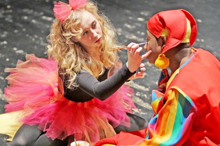 Camille Pileggi and Michael Adkins prepare for a production yesterday at the High School for Creative and Performing Arts.