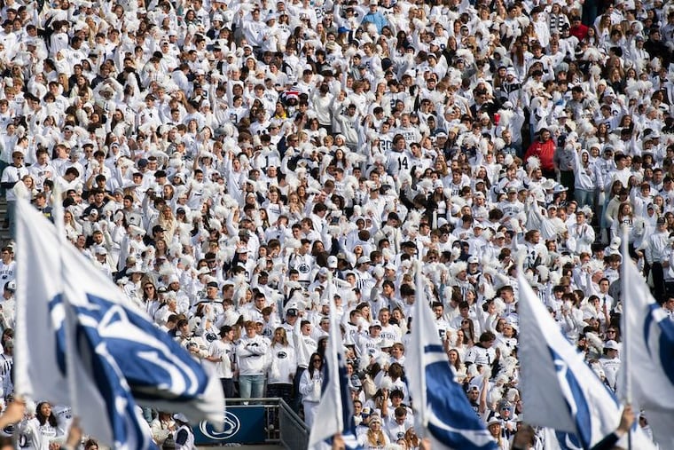 Penn State students cheer on the Nittany Lions before the start of an NCAA football game against Michigano on Nov. 11, 2023.