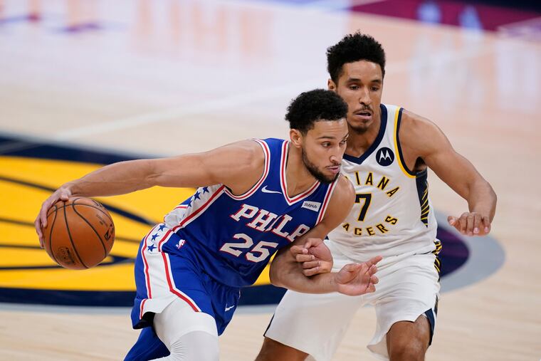 Ben Simmons drives to the basket against Indiana's Malcolm Brogdon during the first half of the Sixers' 113-107 preseason win on Friday.