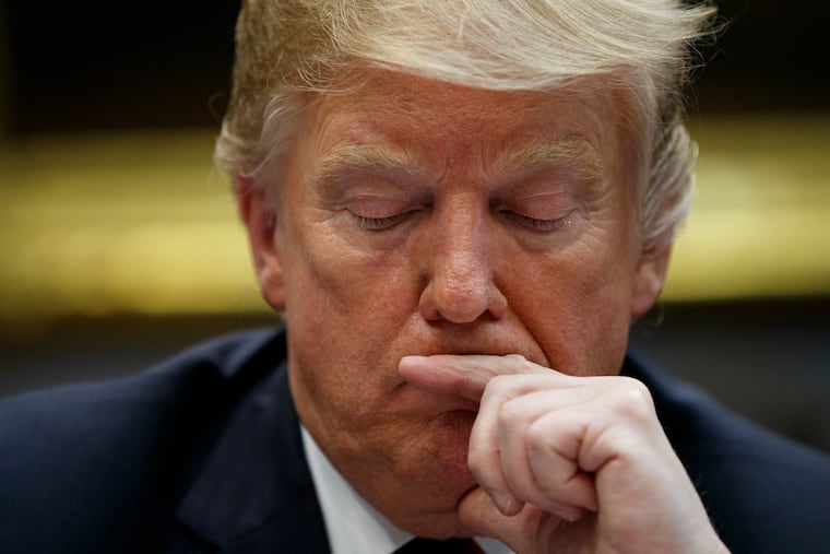 President Donald Trump listens during a briefing on drug trafficking at the southern border at the White House Wednesday. The Senate on Thursday voted to reject Trump's emergency declaration meant to secure billions of dollars of additional funding for a border wall along the U.S.-Mexico border. Trump is expected to veto the measure.