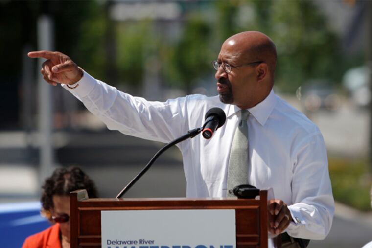 Mayor Michael Nutter gives his remarks at the opening of the Delaware River Trail on Monday morning. The trail is sponsored by the Delaware River Waterfront Corporation, and 5 miles have already been paved and opened. (LUKE RAFFERTY/Staff Photographer).