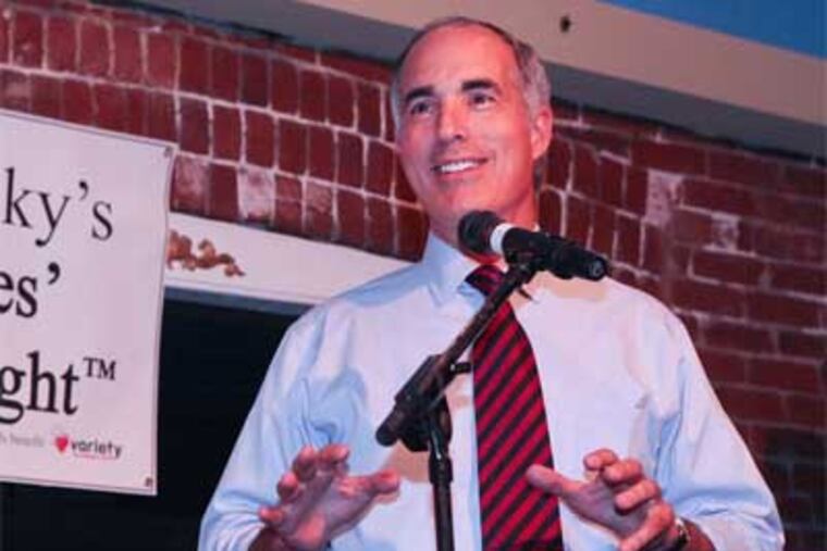 Democratic incumbent Senator Bob Casey performs at the 22nd Annual "Stu Bykofsky Candidates Comedy Night" at Finnigan's Wake, in Philadelphia, Wednesday, Aug. 22, 2012. (Steven M. Falk / Staff Photographer)