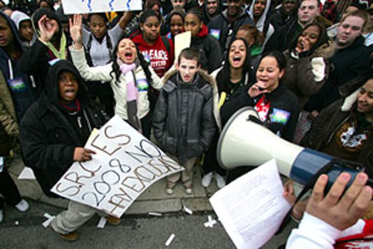The students will join other groups later today to ask the district to create four small schools at Olney High.
