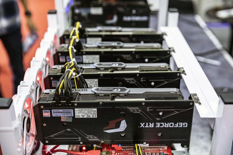 A cryptocurrency mining rig equipped with Nvidia Geforce GPU at the Thailand Crypto Expo 2022 in Bangkok, Thailand, in May. The Biden administration is moving one step closer to developing a central bank digital currency, otherwise known as the digital dollar. It's a step that administration officials said would help reinforce the U.S. role as a leader in the world financial system.