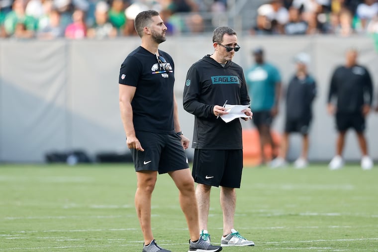 General manager Howie Roseman (right) with head coach Nick Sirianni, had some big decisions to make as the Eagles trimmed their roster to 53.