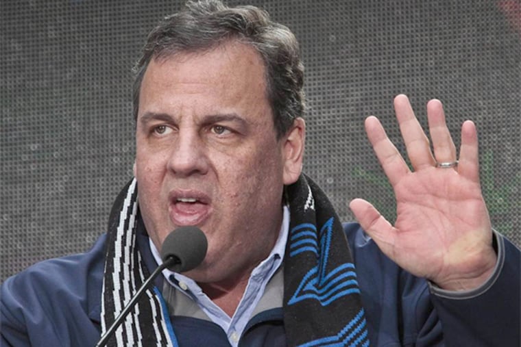 Gov. Chris Christie speaks during a Super Bowl event in New York, where he was booed by fans.