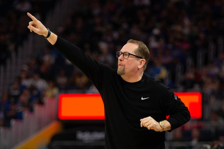 Philadelphia 76ers head coach Nick Nurse instructs his players during the first half of Tuesday's game against the Golden State Warriors.