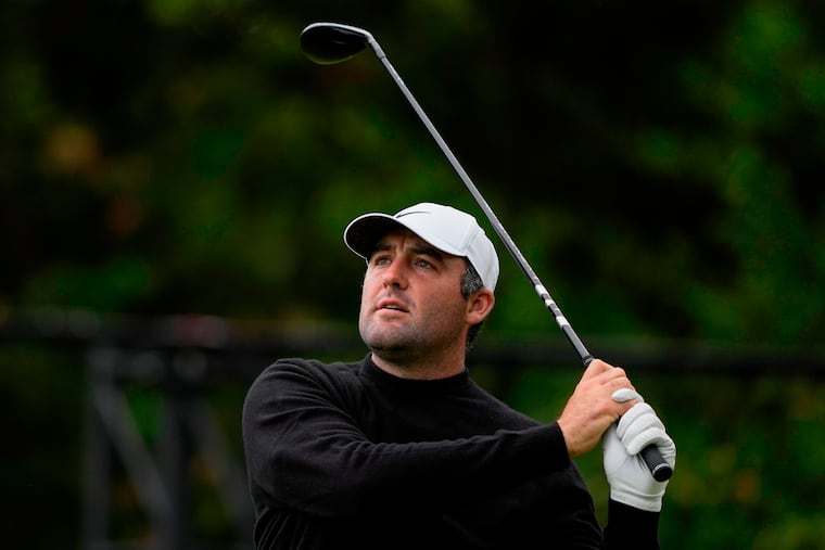 Scottie Scheffler hits from the 13th tee during the second round of the PGA Championship golf tournament at Aronimink Golf Club, Friday, May 15, 2026, in Newtown Square, PA. (AP Photo/Carolyn Kaster)