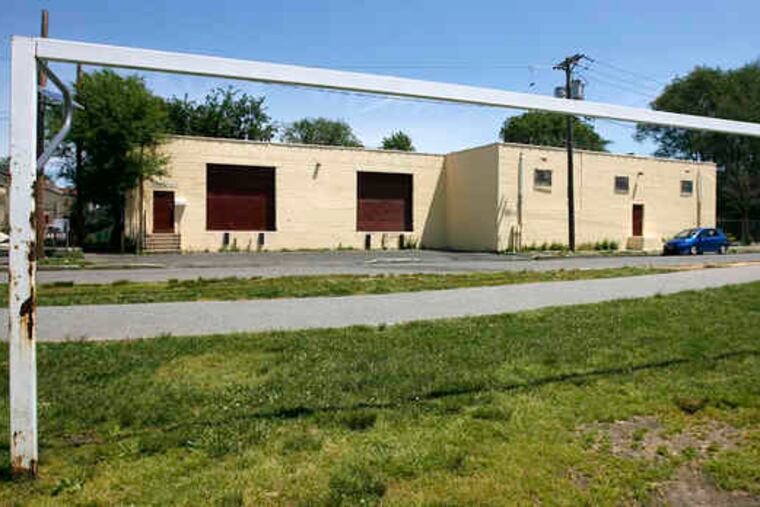 Sources told a newspaper that computers and documents were removed from this Camden warehouse where Iqbal Hinjhara and Muhammad Fiaez operate a printing business.