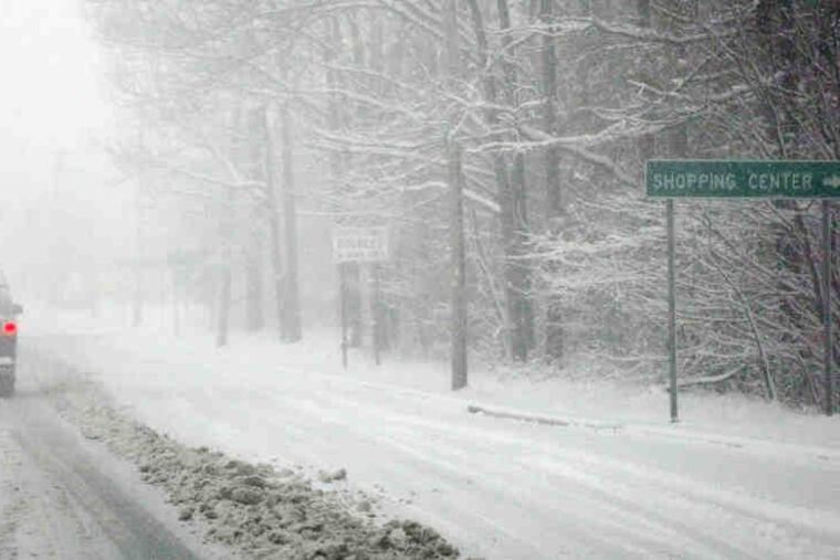 Route 66 near Tinton Falls was among New Jersey roads hit hard by Sunday's snowstorm. One mayor called such scenes "the new picture of New Jersey government."