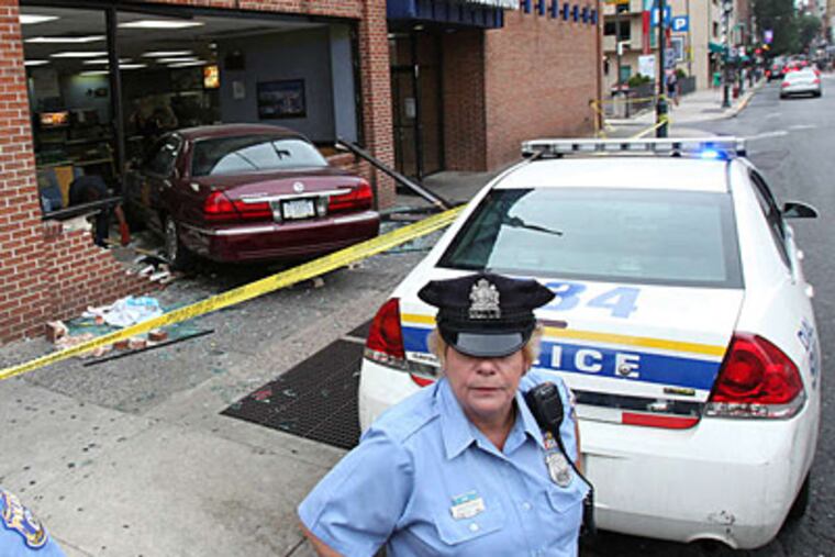 An 85-year-old man crashed his car into a Burger King at 8th and Market streets in July. (Steven M. Falk/Staff)