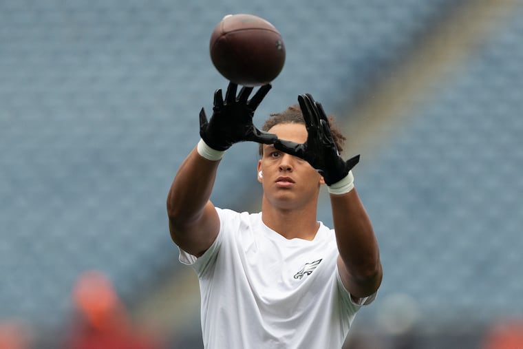 Eagles tight end Eli Stowers catches the football during pregame warmups before the Eagles preseason game against the New England Patriots last Saturday.