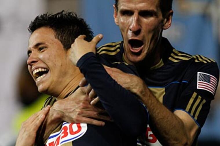 Roger Torres (left) scored one of the Union's five goals against Harrisburg last night. (Laurence Kesterson/Staff file photo)