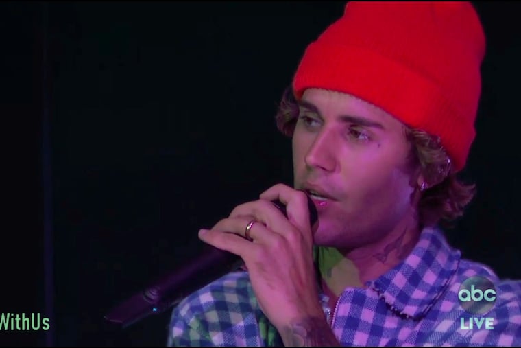 Justin Bieber performs at the American Music Awards in Los Angeles in November 2020. The former teen star will headline the Made in America festival on Labor Day weekend in Philadelphia. (ABC via AP)