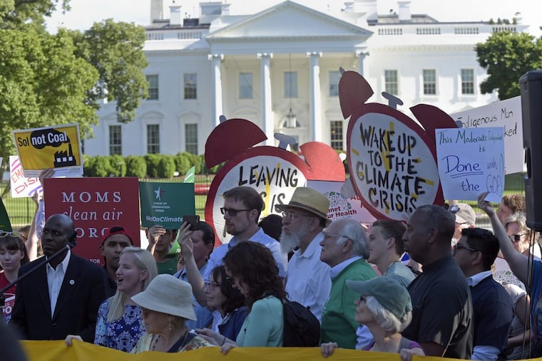 President Trump’s decision to withdraw from the Paris climate change accord has sparked protests in Washington and elsewhere.