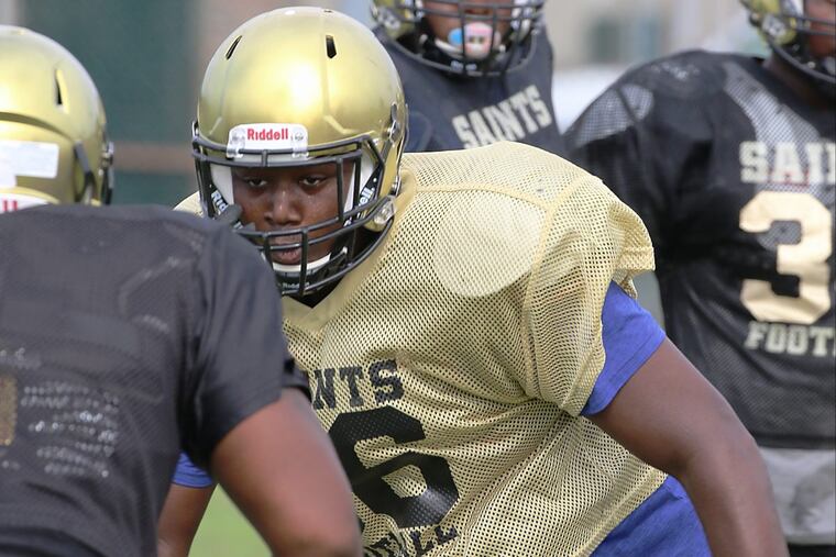 Newmann-Goretti senior defensive lineman Christian Barmore is mulling Division I scholarship offers.