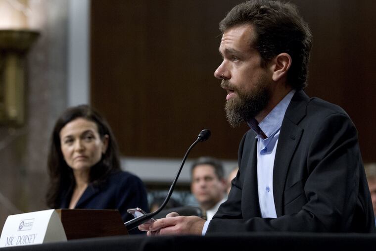Twitter CEO Jack Dorsey, accompanied by Facebook COO Sheryl Sandberg, testify before the Senate Intelligence Committee hearing on 'Foreign Influence Operations and Their Use of Social Media Platforms' on Capitol Hill.