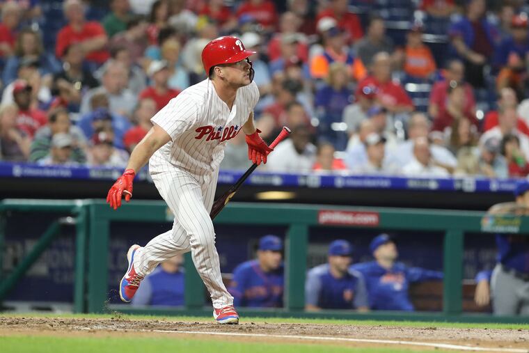 Phillies' slugger Rhys Hoskins doubles in the third inning against the Mets on Wednesday.