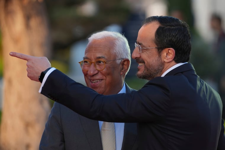 European Council President António Costa (background) is welcomed by Cypriot President Nikos Christodoulides ahead of Thursday's EU Summit in Ayia Napa, Cyprus.