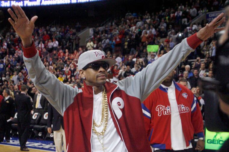 Allen Iverson is introduced to the crowd before the start of the Charlotte Bobcats and 76ers basketball game, Saturday, March 30, 2013, in Philadelphia. Iverson was honored with a bobblehead giveaway. The bobblehead was made in his likeness. (H. Rumph Jr/AP)