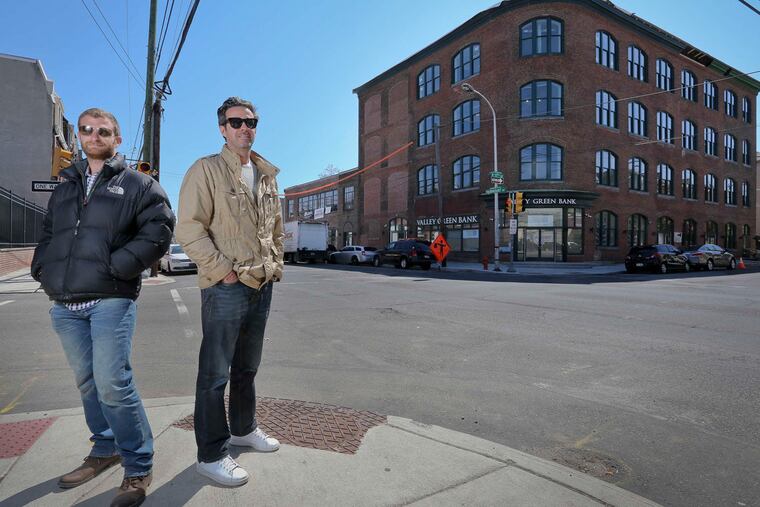 David Waxman (right) and Aaron Smith's $12M project will include 17 apartments, plus retail business.