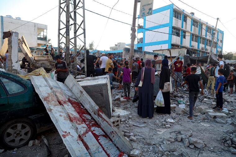 The aftermath of the Israeli airstrike on a U.N.-run school that killed dozens of Palestinians in the Nusseirat refugee camp in the Gaza Strip on Saturday, July 6, 2024.