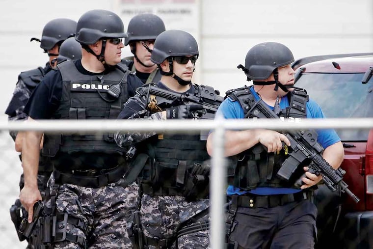 Authorities search for a suspect after Officer Christopher Dorman was shot seven times. Donte Brooks Island was arrested after a three-hour manhunt in Delaware County.