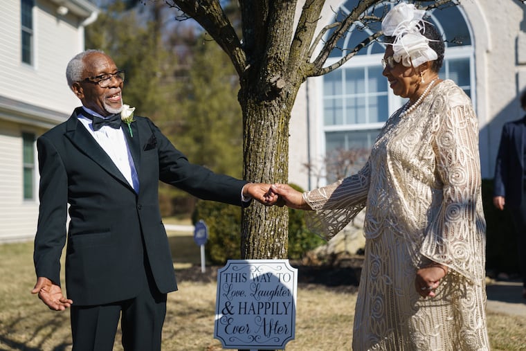William Small and Joyce Brown pose for photos after their wedding in Mount Laurel, N.J.