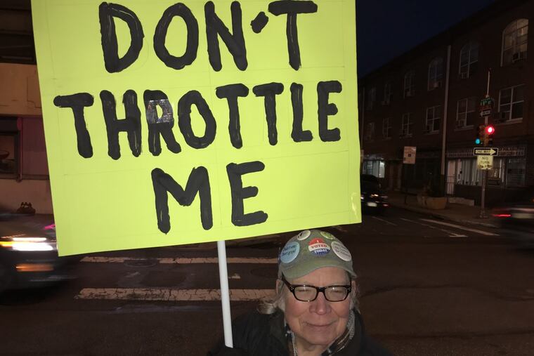 John Prenis, Northeast Philadelphia, protested the Federal Communications Commission's plan to roll back net neutrality on Dec. 7 at a Verizon building in Philadelphia.