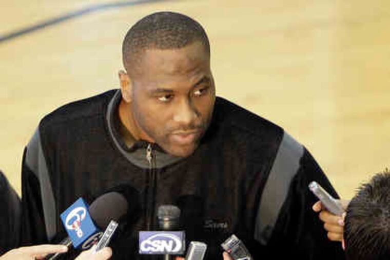 Sixers forward Elton Brand speaks with reporters after the team had fired coach Eddie Jordan."It didn't work out, it didn't fit," Brand said of Jordan's complicated motion offense.