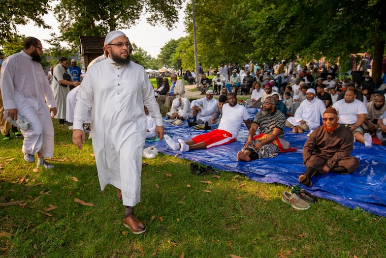 Dr. Tahir Wyatt with the United Muslim Masjid arrives to give the morning prayer at Durham Park.